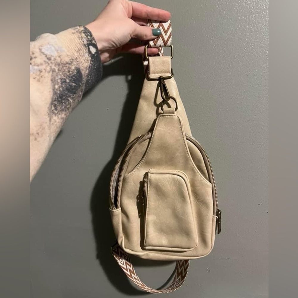 Sling bag with guitar strap